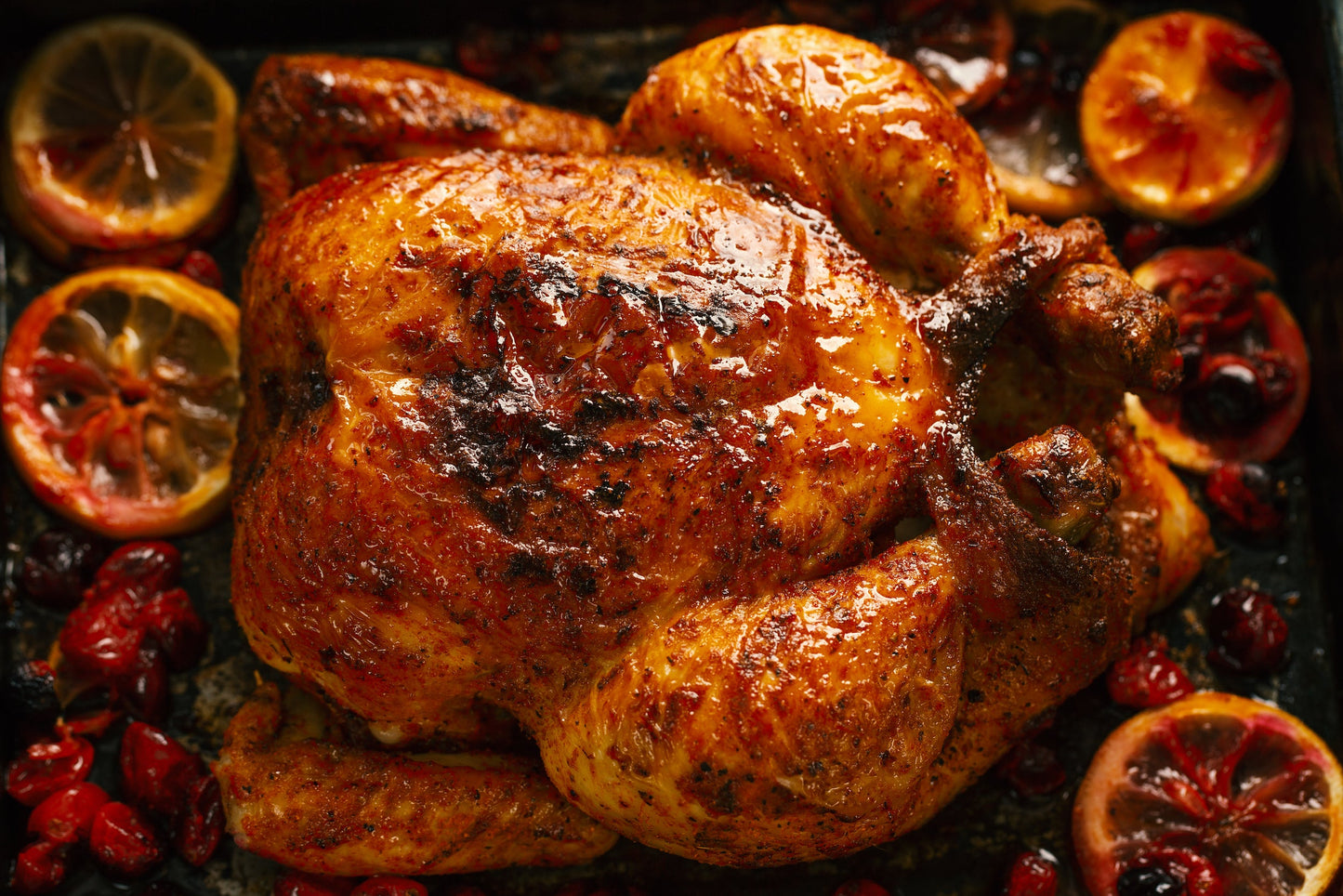 oven baked whole chicken with oranges and cranberries