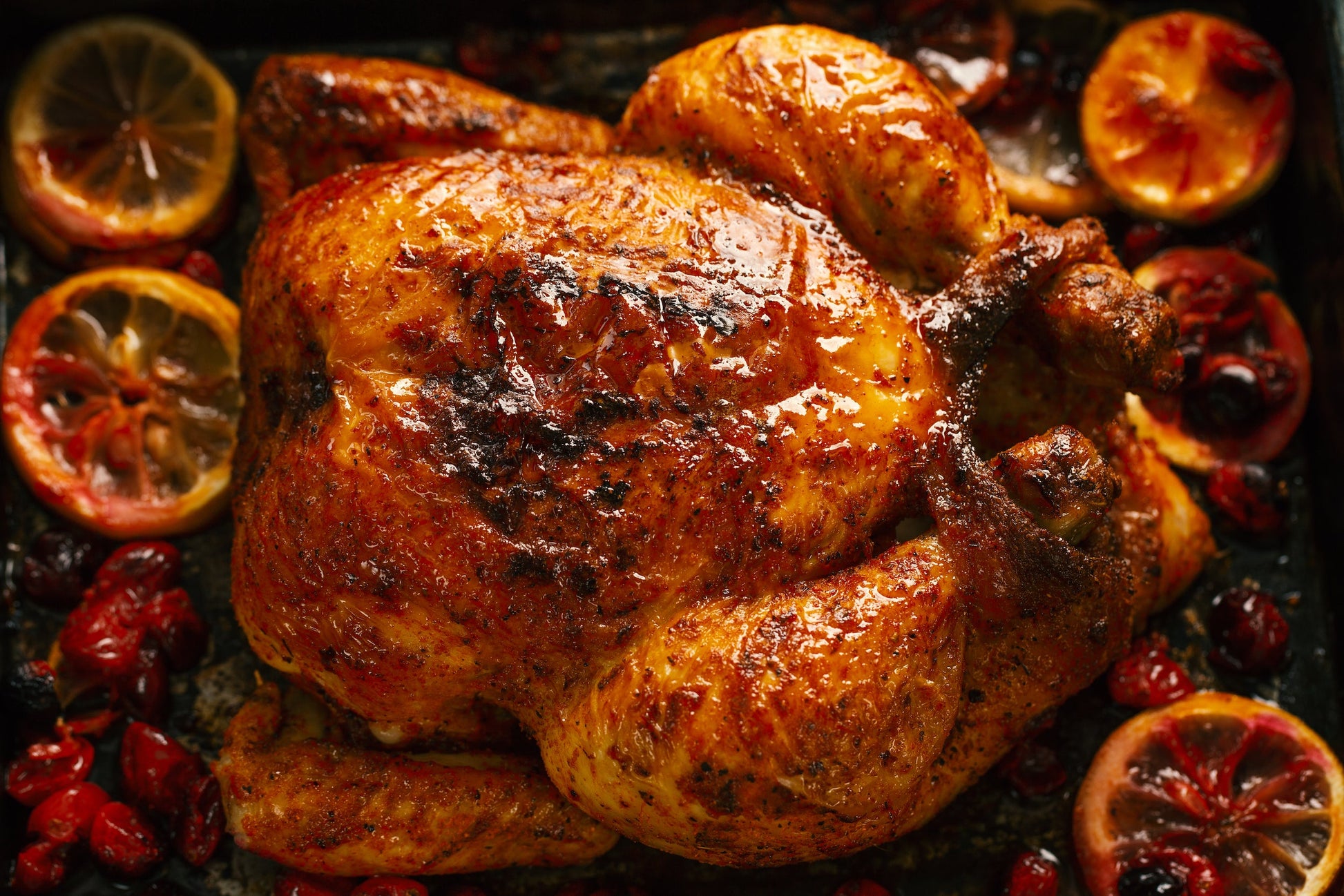 oven baked whole chicken with oranges and cranberries